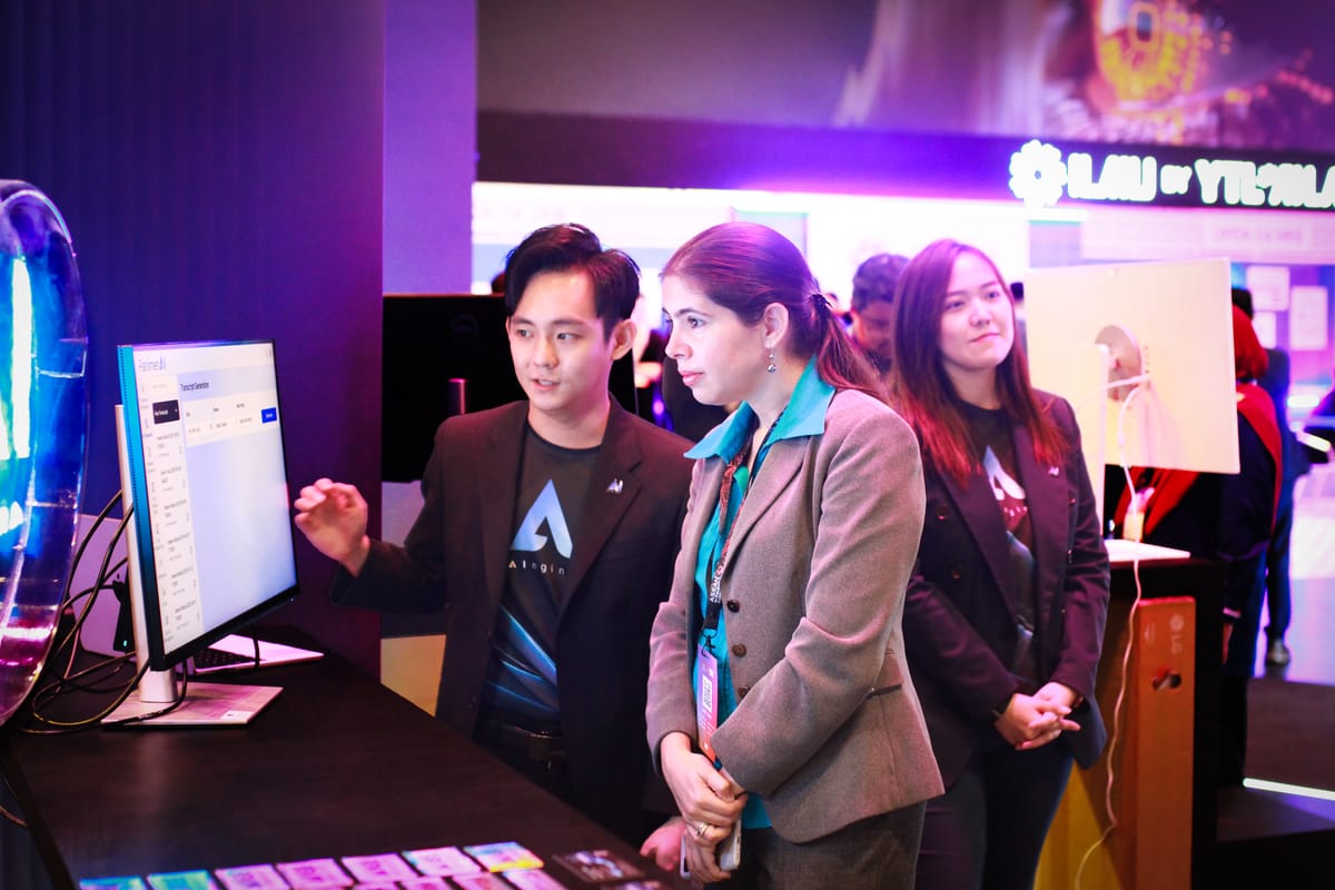 AIngineer demonstrating its solution to a visitor at the ASEAN AI Malaysia Summit